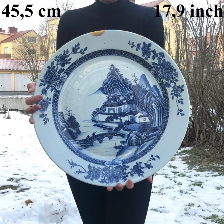 一件绘有风景图案的18世纪大型盘子